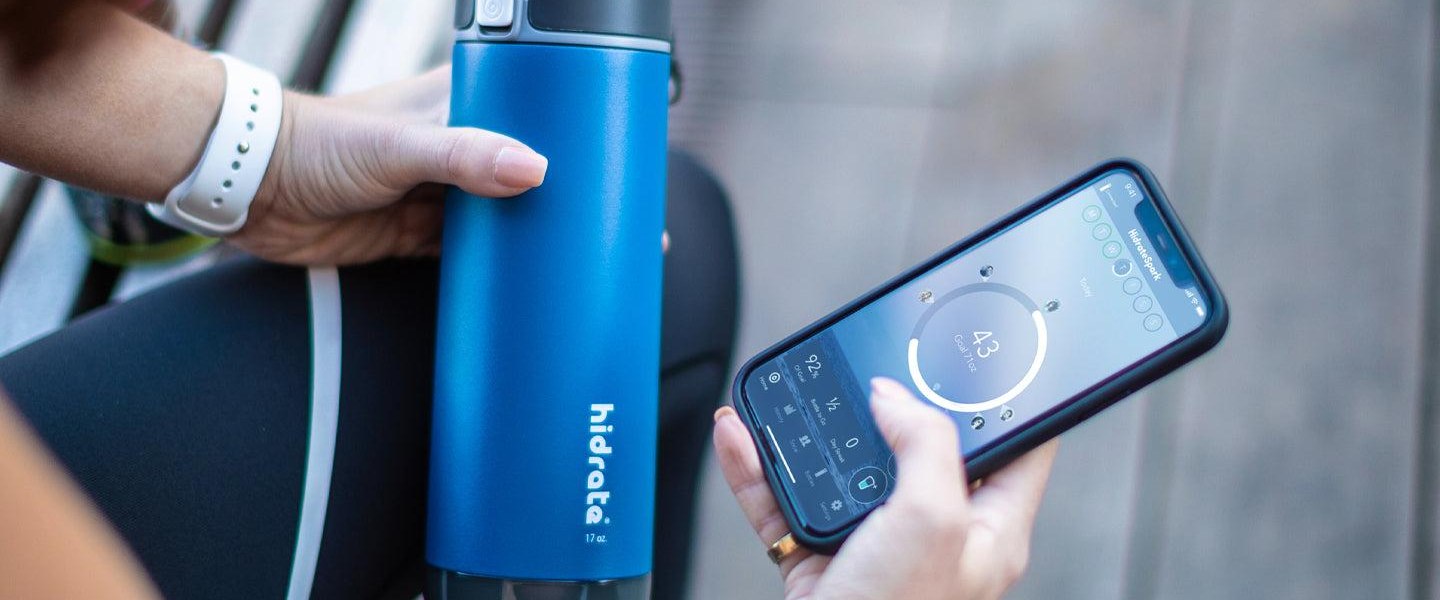 Smart water bottle paired with the hydration tracking app